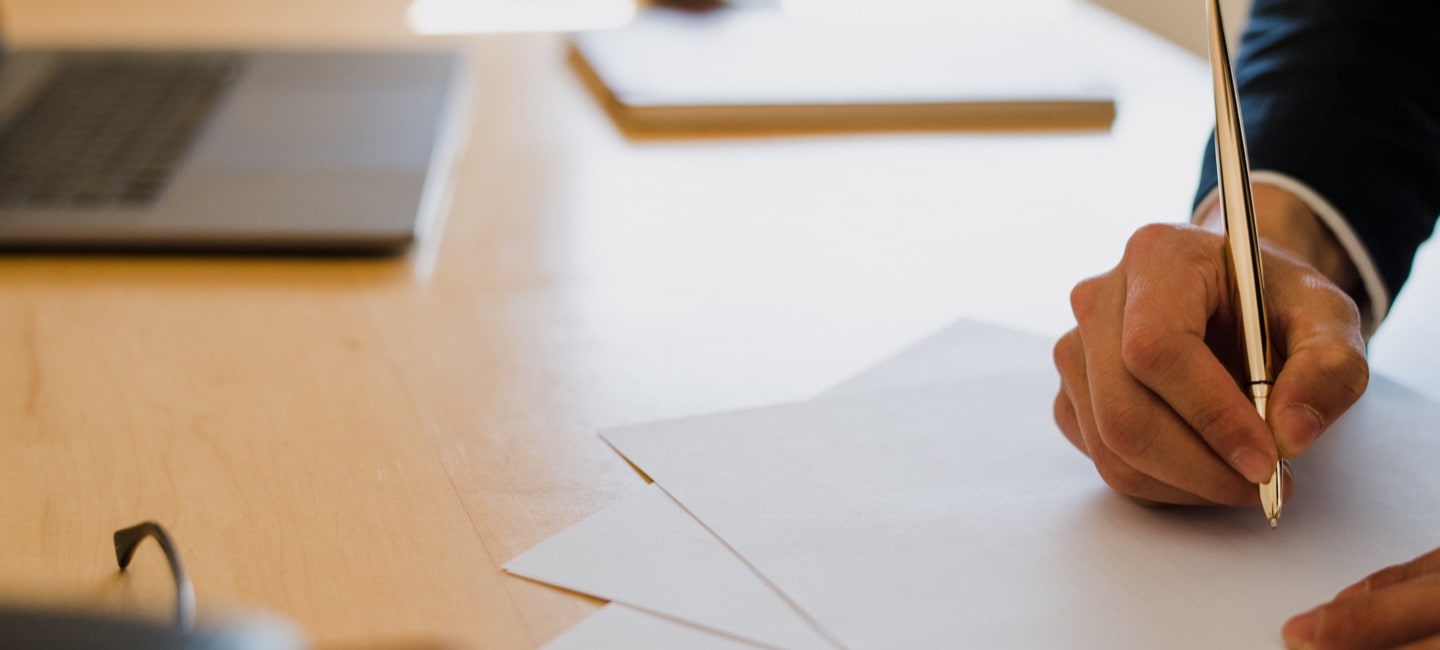 man writing a will